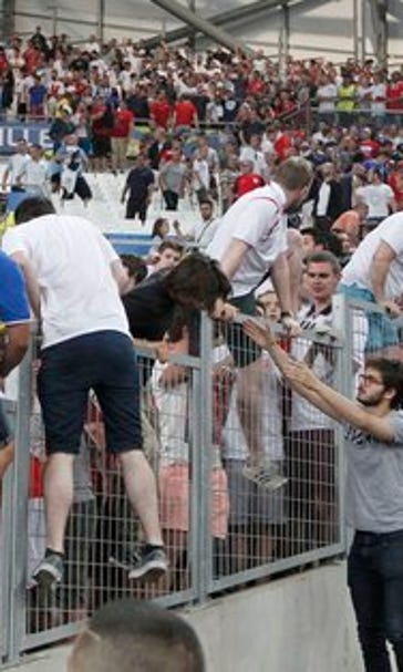 UEFA charges Russia over violence, enhances stadium security